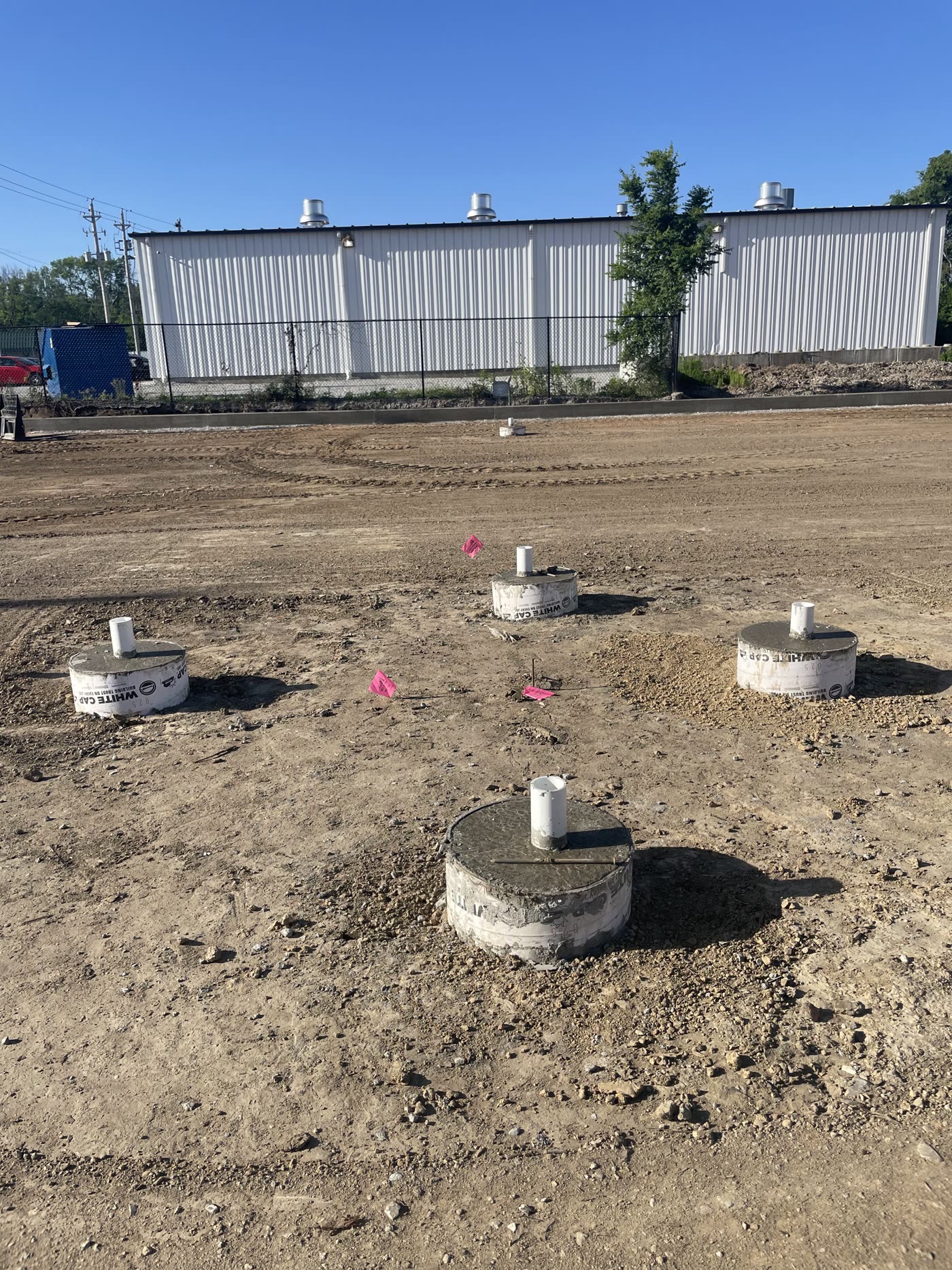 Concrete footings with sleeves