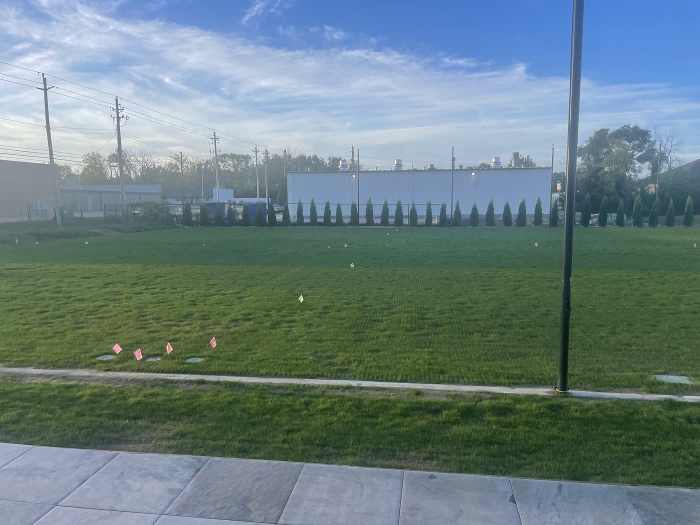Established grass court with walkway
